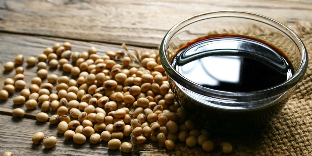 Soy sauce ,Soya, and soybean on a table.